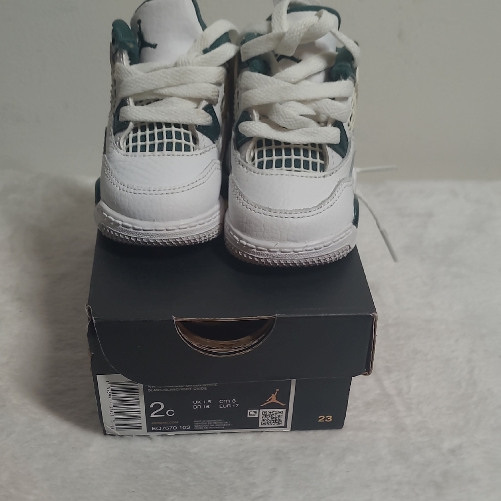 Jordan White and Green High-Top Sneakers